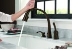 how does a touchless faucet work